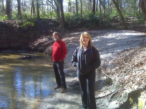 Cilla and Greg on the bank of Hogtown Creek